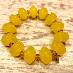 Vintage Tarina Tarantino Yellow Carved Lucite Charm Bracelet